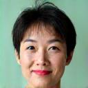 Portrait of Sara Cheng, a thoughtful woman with glasses, symbolizing a nutritionist.
