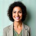 Portrait of Dr. Elara Vance, smiling warmly, a certified nutritionist and holistic health coach with a background in functional medicine.